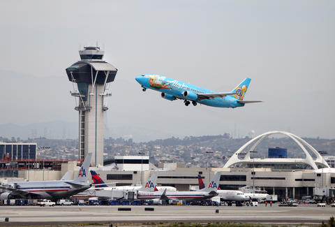 An airplane takes off from Los Angeles.